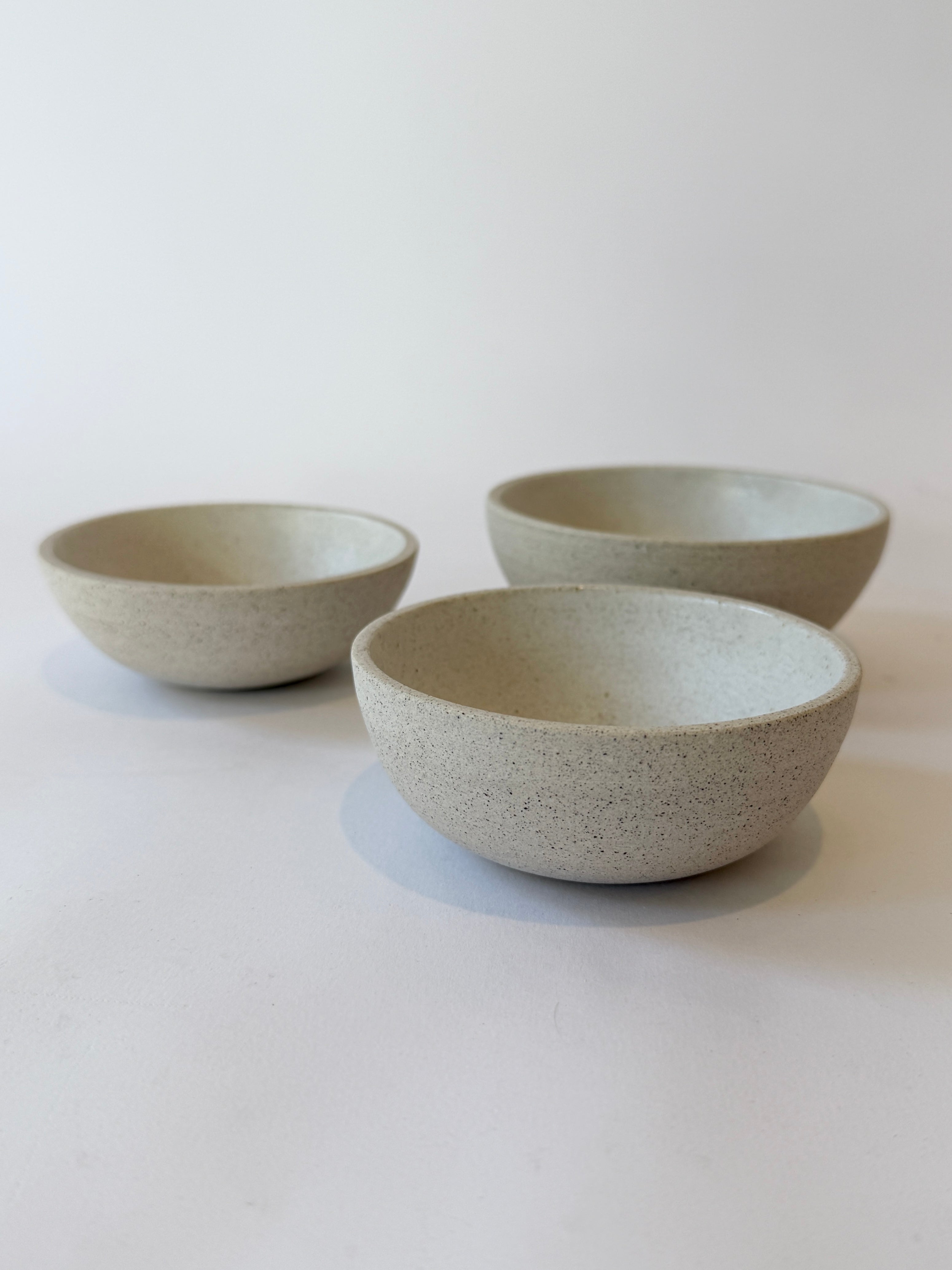 unique hand crafted ceramic dishes with glazed interior and raw exterior.  Great gift idea.