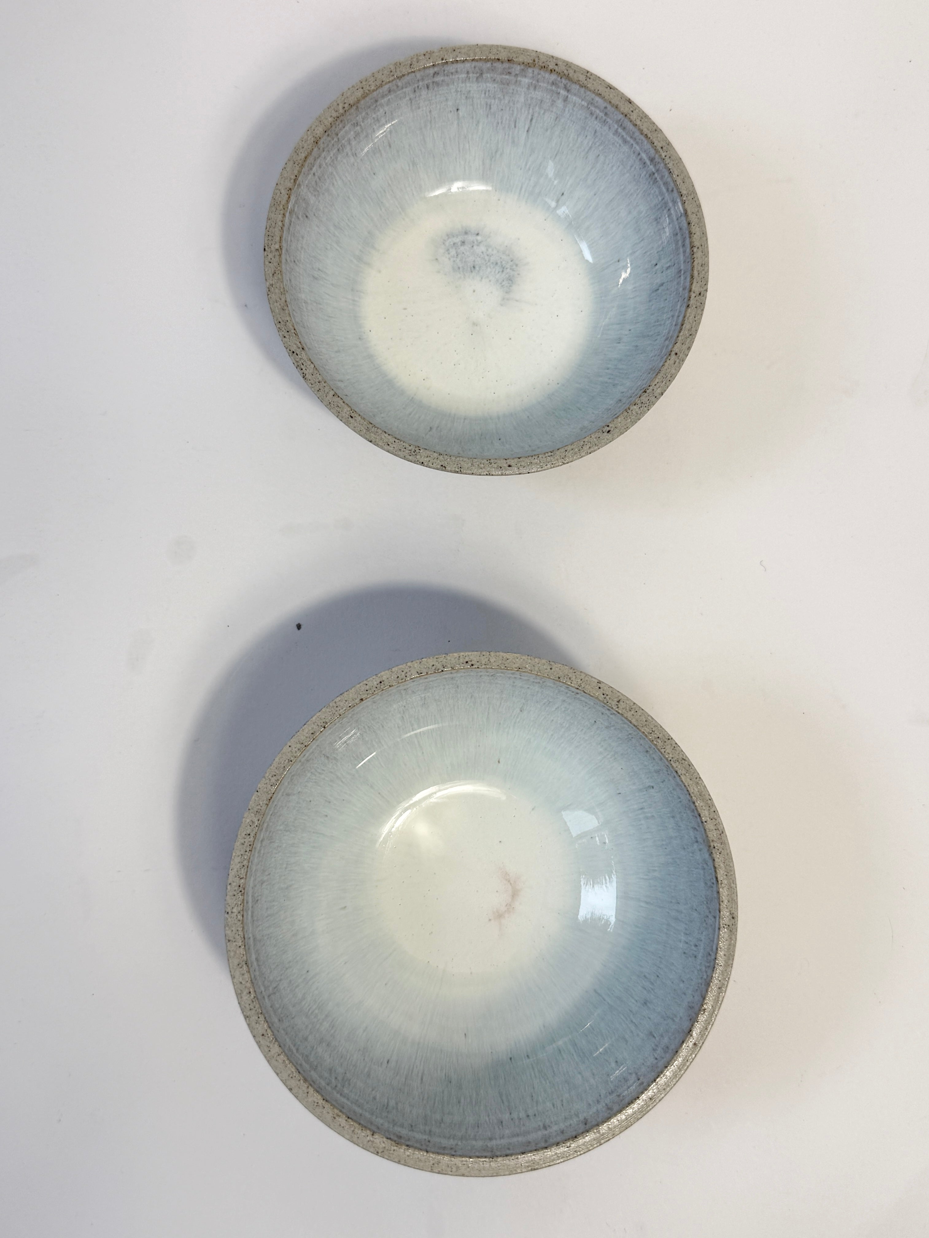 Two handmade ceramic bowls with a light blue pearl glaze.  Created with beautiful speckled grey clay.