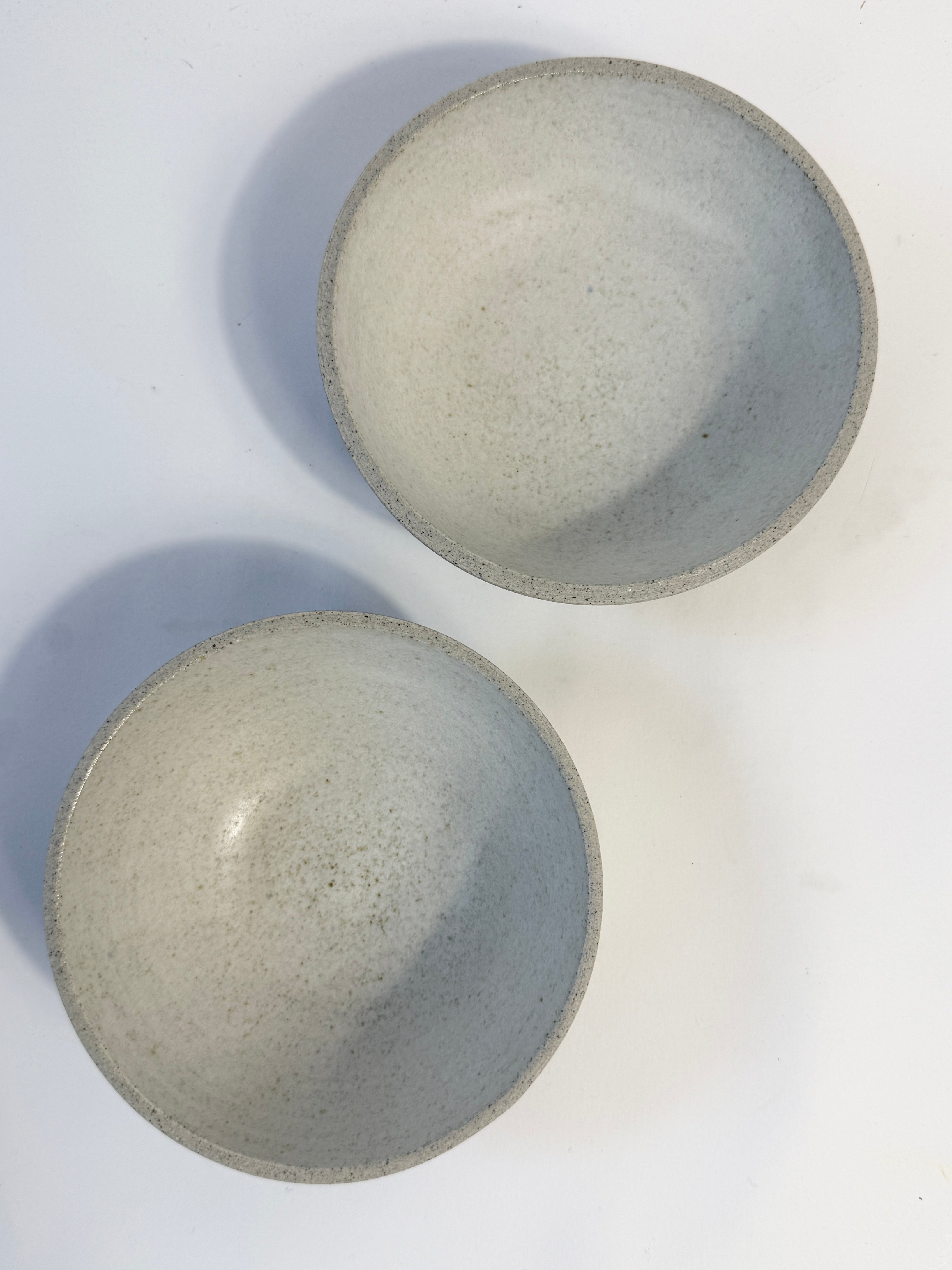 Interior view of the white glazed used on the bowls with the exterior being unglazed natural grey speckled clay.
