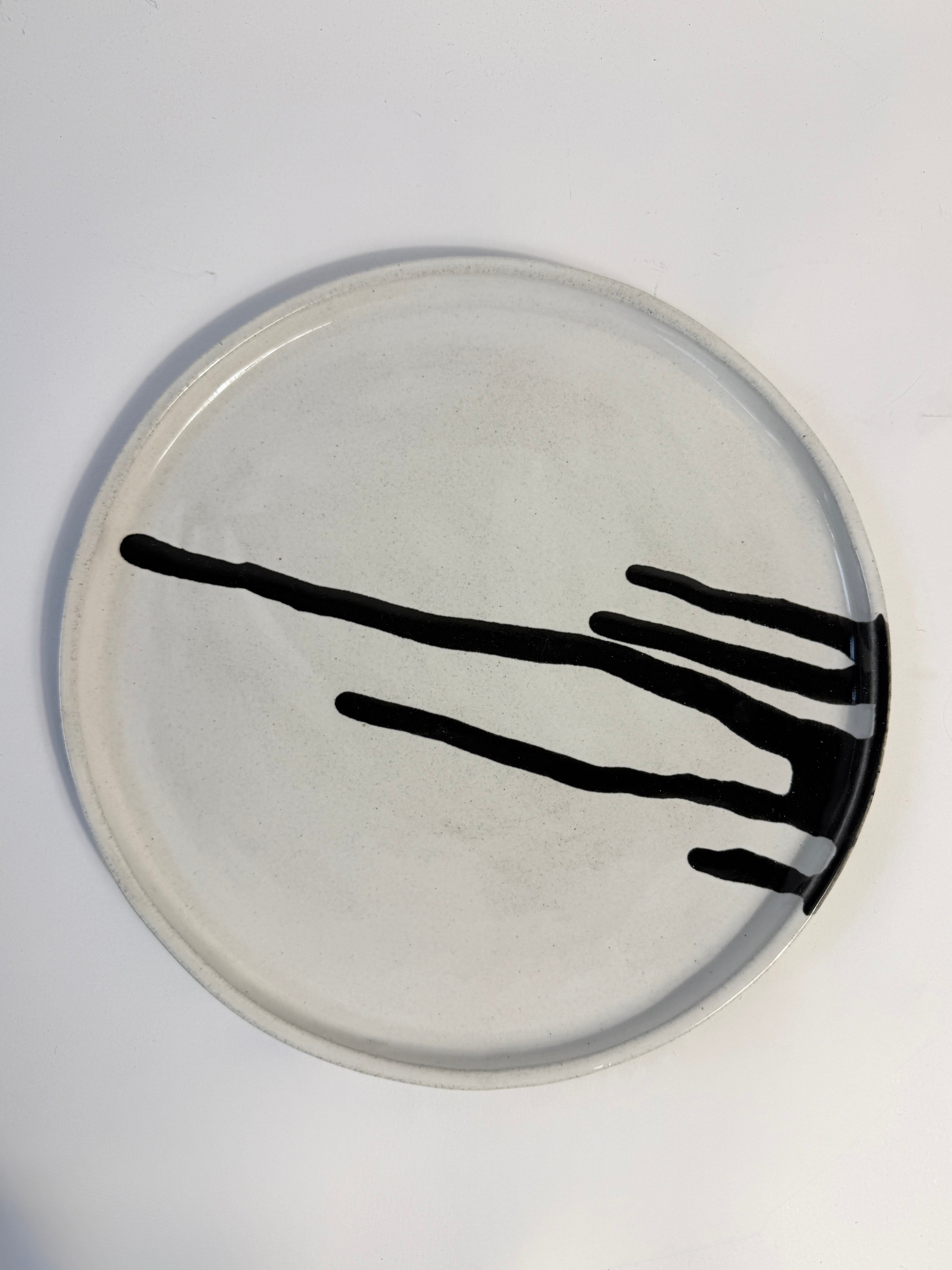 Unique and handmade ceramic plate or platter. 